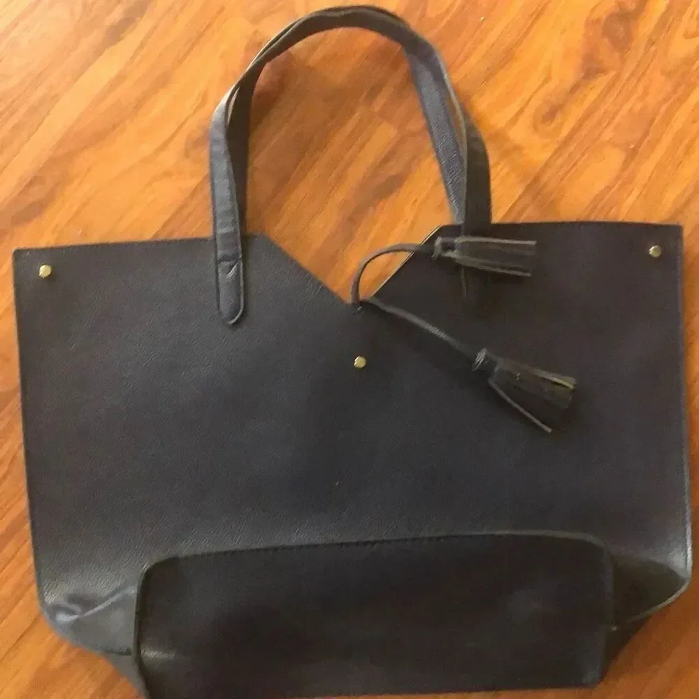 Neiman Marcus navy medium size tote with tassels